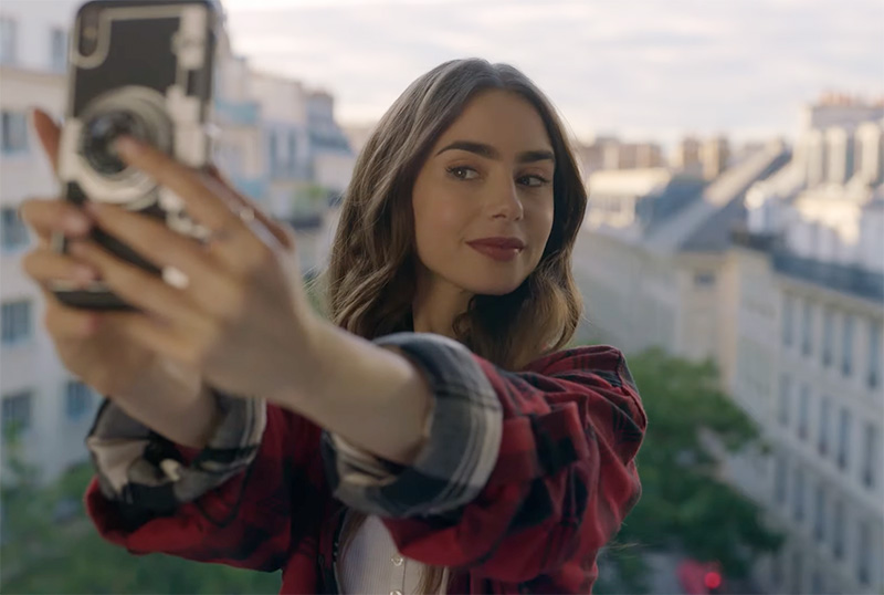 Lily Collins films her upcoming TV drama Emily in Paris with her French  co-star