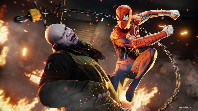 Marvel's Spider-Man Punching A Man Representing Marvel's Avengers
