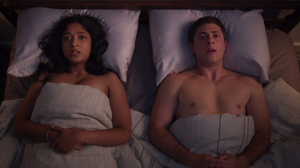 Devi and Ben Gross in bed.