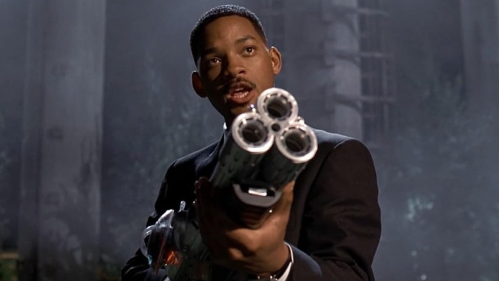 Will Smith holds gun in Men in Black.