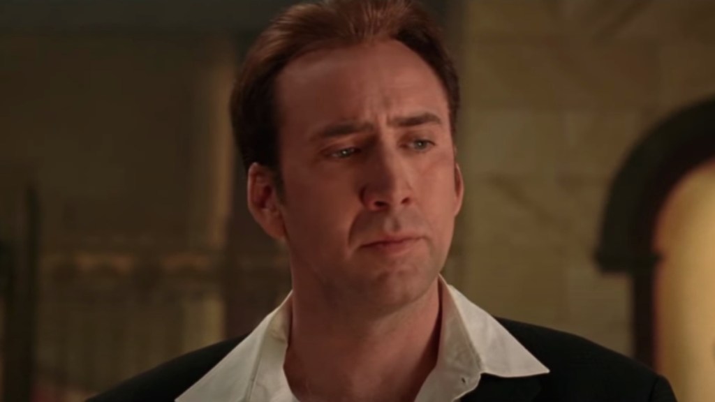 Nicolas Cage looking at the Declaration of Independence in National Treasure