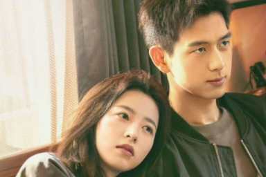 Zhou Yutong rests her head on Li Xian's shoulder in Will Love In Spring poster