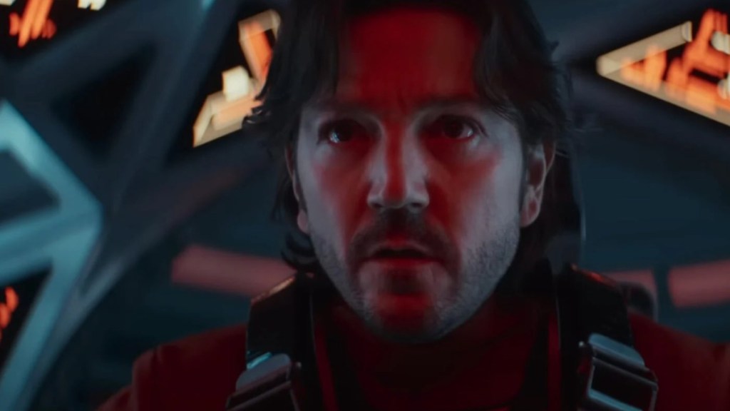 Cassian Andor looks on intently while in a ship.