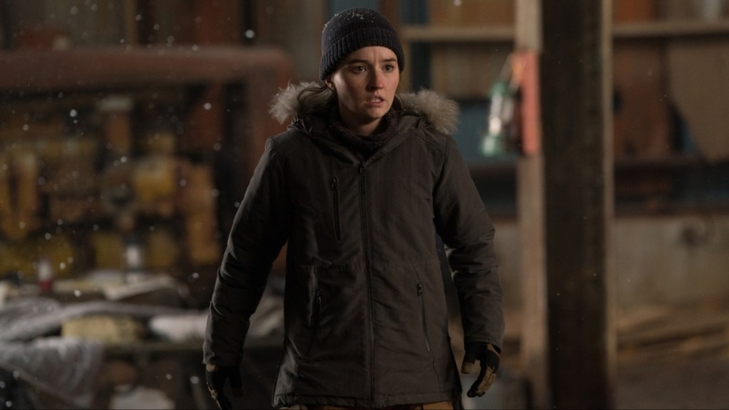 Kaitlyn Dever stands and looks nervous.