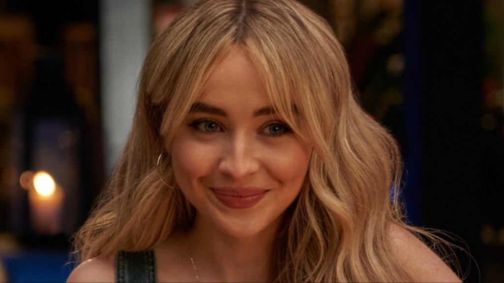 Sabrina Carpenter smirks in Tall Girl 2.