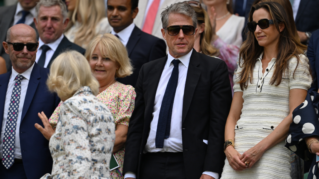 Hugh Grant Spotted Sleeping at Wimbledon Behind Queen Camilla