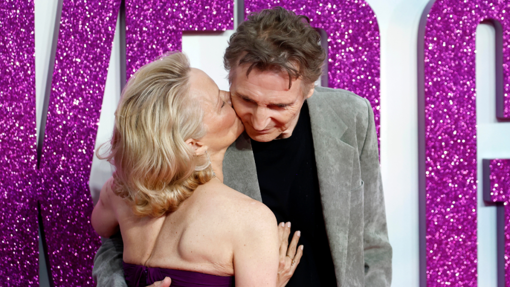 Liam Neeson & Pamela Anderson Share a Kiss at Naked Gun Premiere