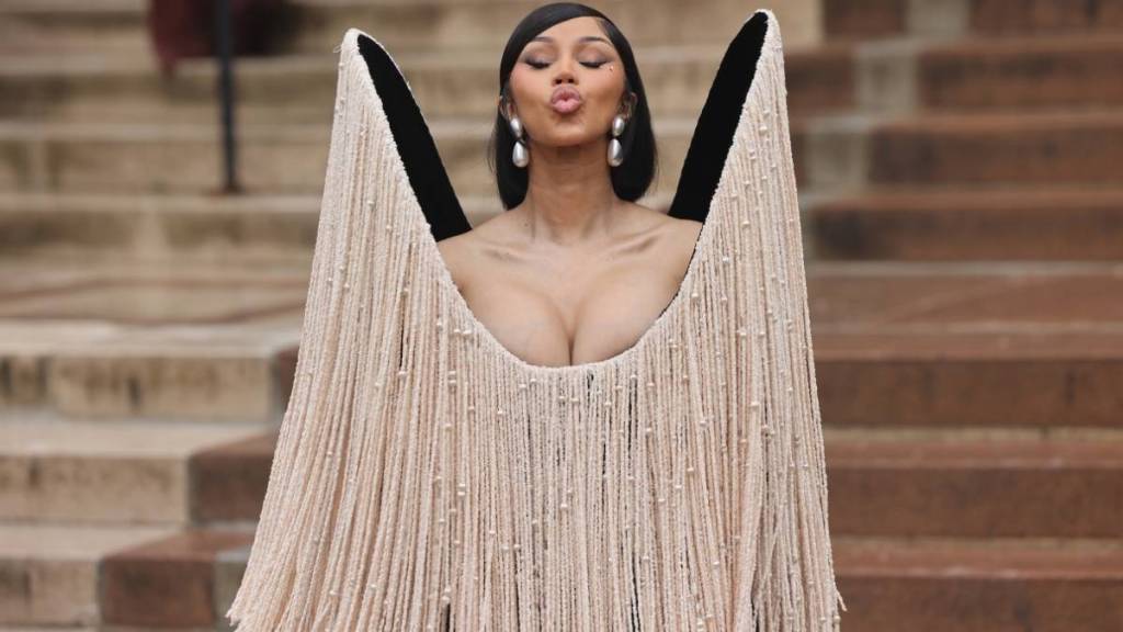 'Cardi B Crow' Trend Explained Amid Singer's Paris Couture Week Look