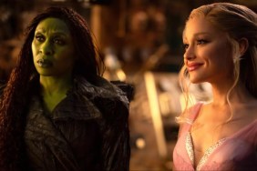 Glinda and Elphaba stand next to each other.
