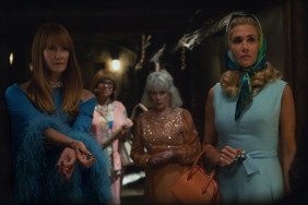A group of women stare and look.