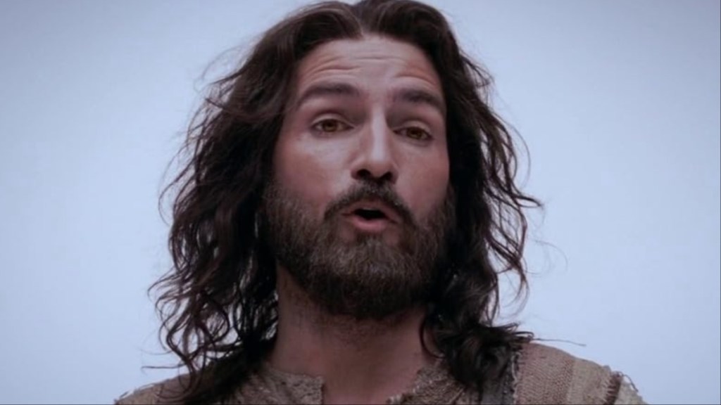 Jim Caviezel looks and stares.
