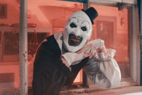 Art the Clown smiles sadistically.