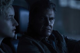 A man and woman sit in the car in Weapons.