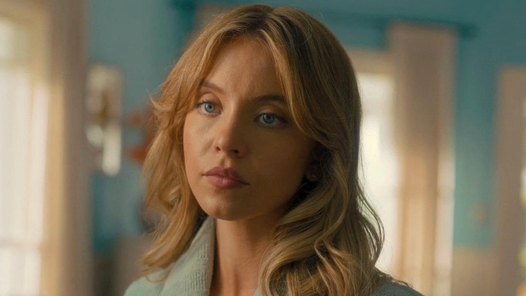 Sydney Sweeney looks and stares.