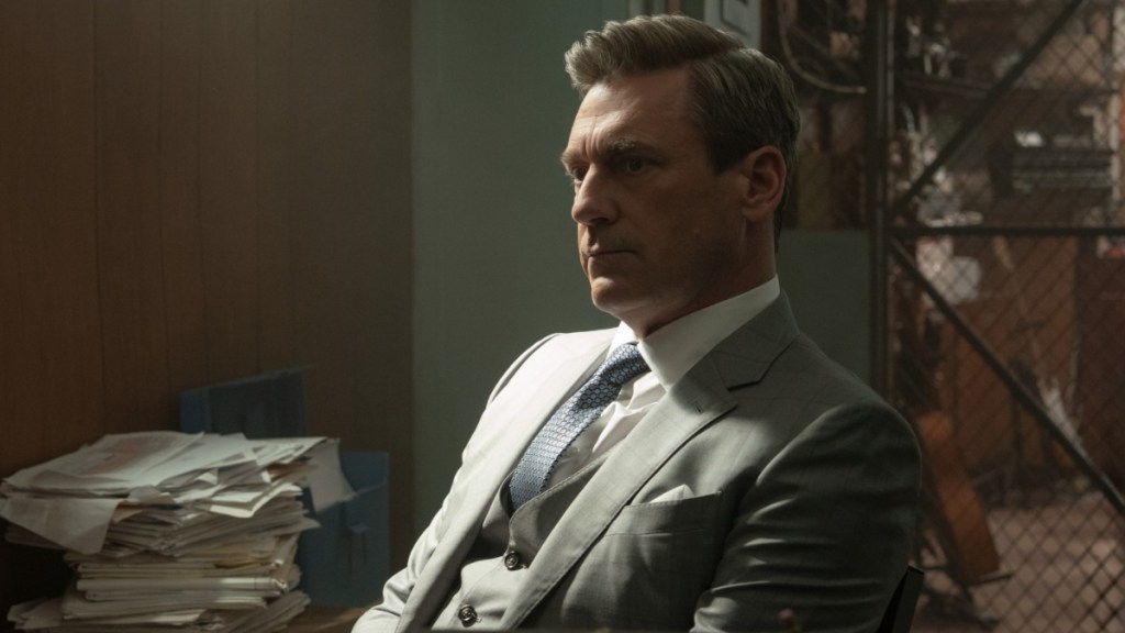 Jon Hamm sits down and stares in Your Friends & Neighbors.