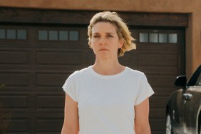 Rhea Seehorn stands and looks in Pluribus.