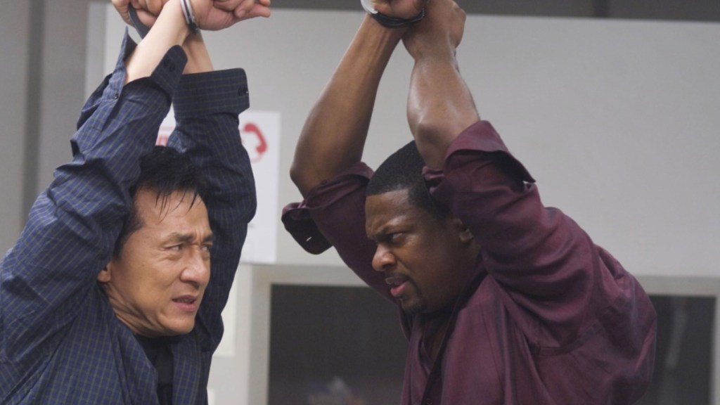 Jackie Chan and Chris Tucker hold their arms up in Rush Hour 3.