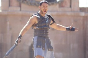 Russell Crowe stands with a sword in Gladiator.