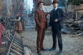 Two men stand in Young Sherlock.