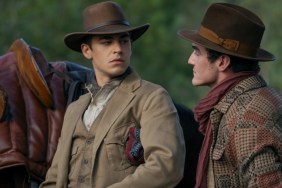 A young Sherlock Holmes stares at another man.