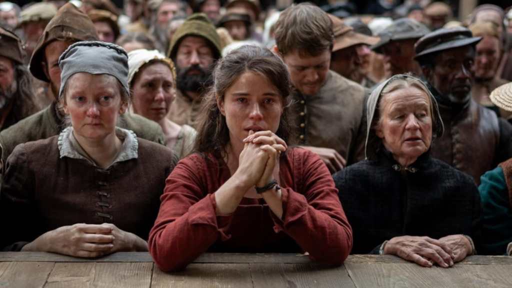 Jessie Buckley prays in Hamnet.