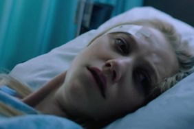 Maika Monroe in a bed in It Follows.