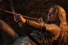 Galadriel pulls an arrow back in The Rings of Power.