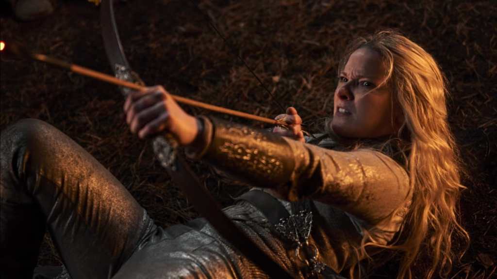 Galadriel pulls an arrow back in The Rings of Power.