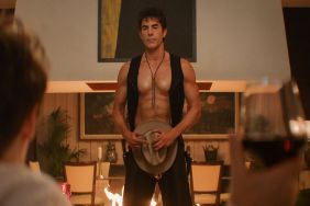 Sacha Baron Cohen & Rosamund Pike's New Netflix Movie Is Loaded With Easter Eggs | Interview