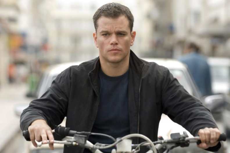 Matt Damon rides a motorcyle in The Bourne Ultimatum.