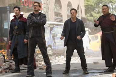 Robert Downey Jr. stands next to three heroes in Avengers: Infinity War.