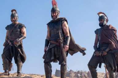 Matt Damon and two other soldiers stand in The Odyssey.