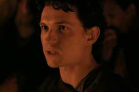 Tom Holland looks on in The Odyssey.