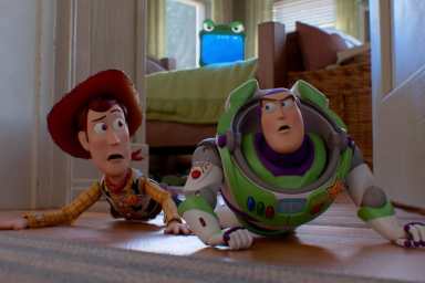 Woody and Buzz crawling in Toy Story 5.