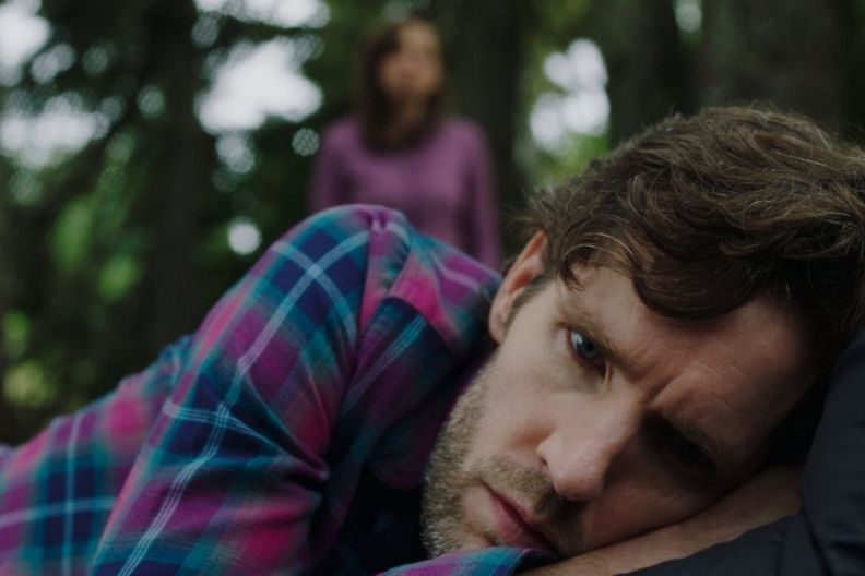 And Her Body Was Never Found Teaser Trailer Previews A Couple's Spiral in The Woods | Exclusive