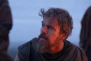 Matt Damon looks up in The Odyssey.
