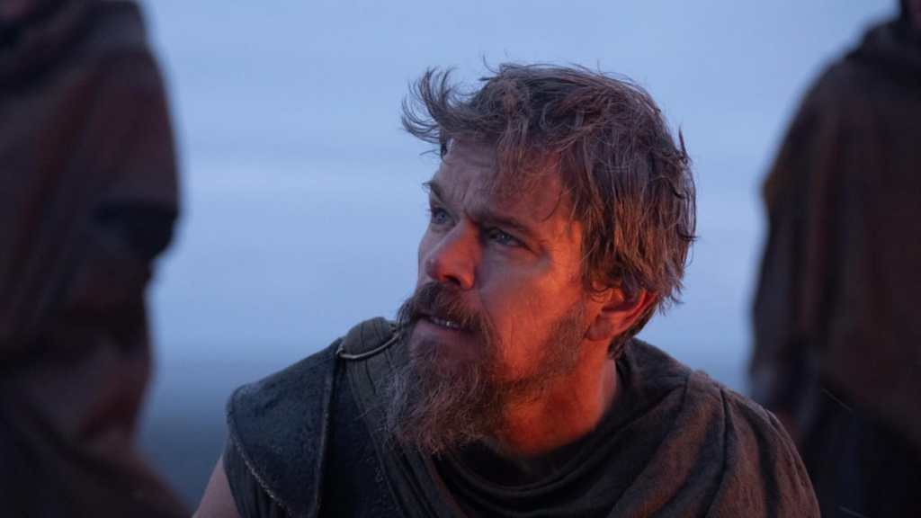 Matt Damon looks up in The Odyssey.