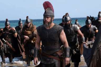 Matt Damon storms the beach in The Odyssey.