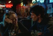 Jake Johnson & Dakota Fanning Make Bad Relationship Decisions in The Sun Never Sets Trailer