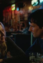 Jake Johnson & Dakota Fanning Make Bad Relationship Decisions in The Sun Never Sets Trailer
