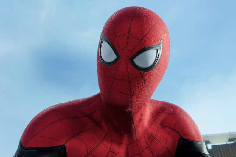 Tom Holland stares in Spider-Man.