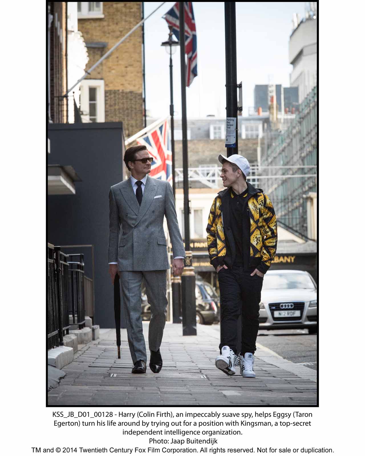 KSS_JB_D01_00128 - Harry (Colin Firth), an impeccably suave spy, helps Eggsy (Taron Egerton) turn his life around by trying out for a position with Kingsman, a top-secret independent intelligence organization.