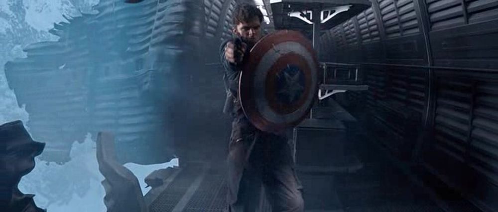 Bucky holds the shield....