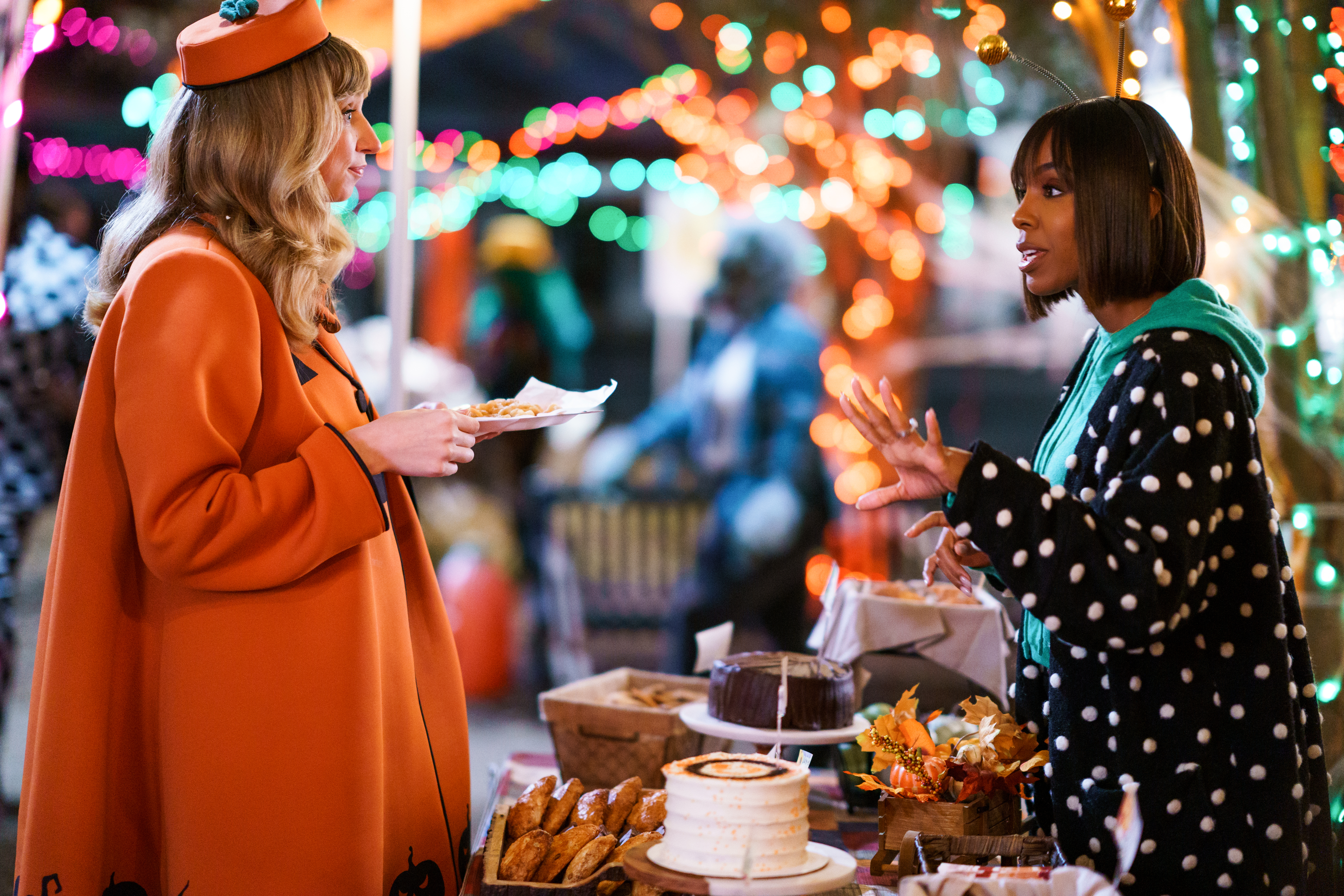 The Curse of Bridge Hollow. (L to R) Lauren Lapkus as Mayor Tammy, Kelly Rowland as Emily in The Curse of Bridge Hollow. Cr. Frank Masi/Netflix Â© 2022.