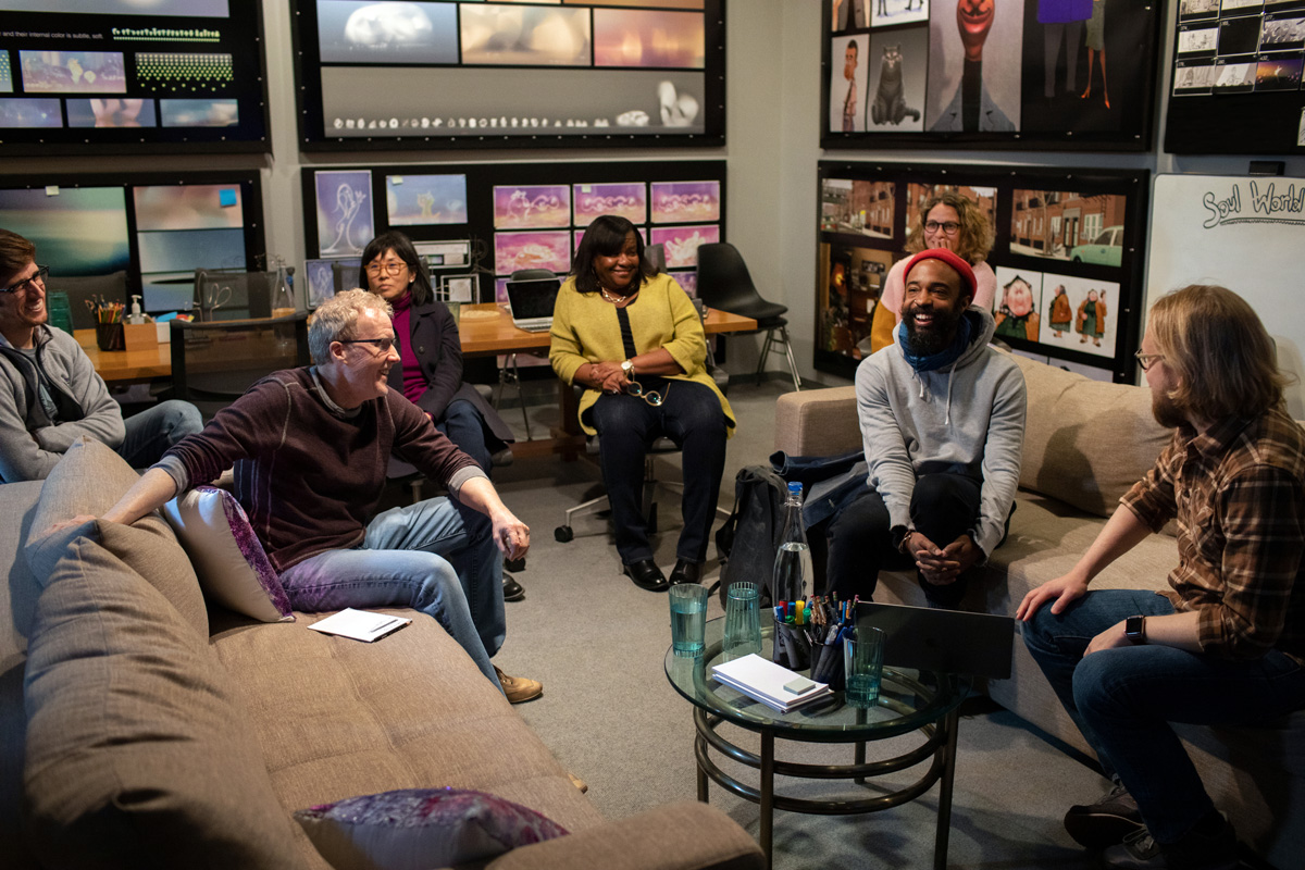 (Second from right) Cinematographer Bradford Young meets with "Soul" film crew members, including Steve Pilcher, Bryn Imagire, Britta Wilson, Jaclyn Simon, and Ian Megibben, on February 5, 2019 at Pixar Animation Studios in Emeryville, Calif. (Photo by Deborah Coleman / Pixar)