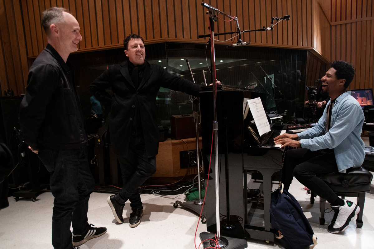 (Right) Jon Batiste records music for "Soul," a Pixar Animation Studios film, and chats with (left) Tom MacDougall and Atticus Ross, on January 3, 2020 at Capitol Studios in Los Angeles, Calif. (Photo by Deborah Coleman / Pixar)